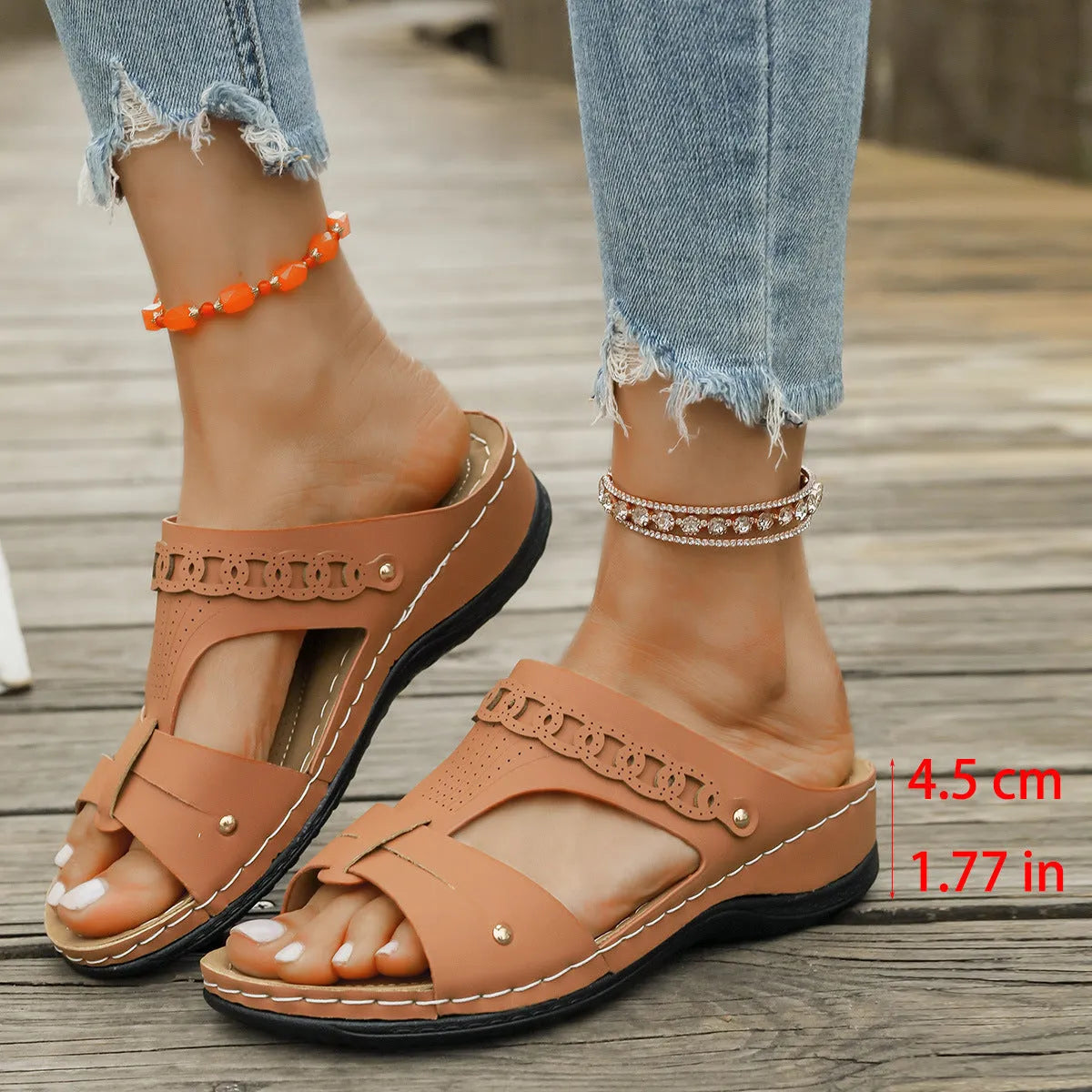 Roman-style slippers with a slope heel and fish mouth toe design in PU leather, shown in beige colour.
