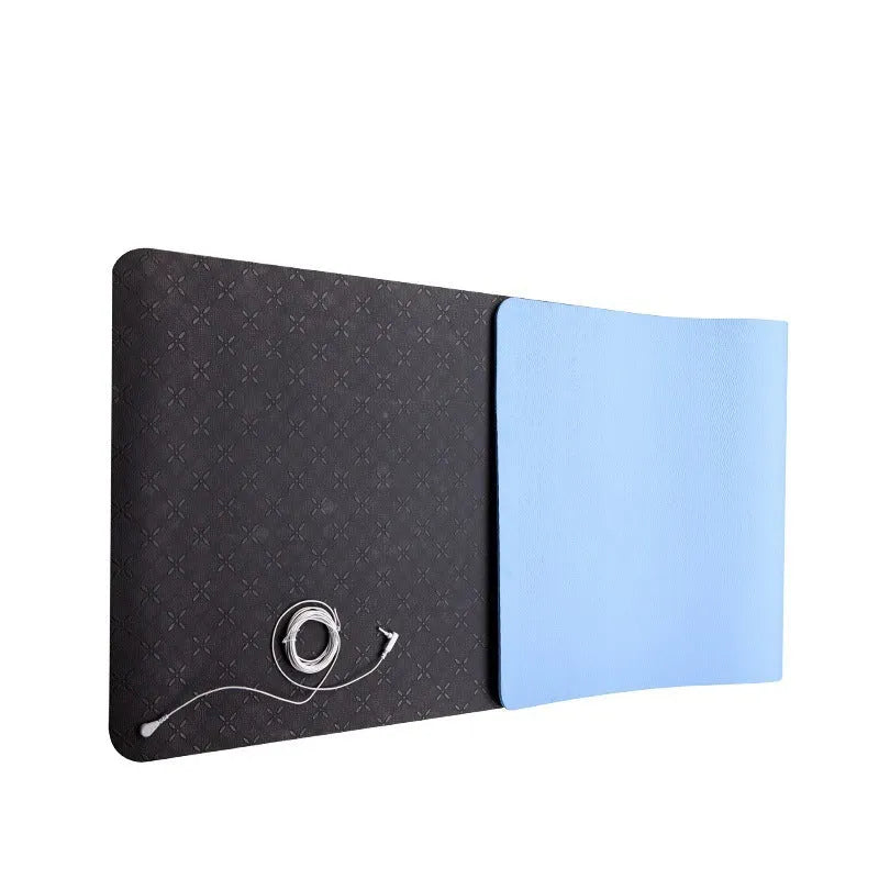 Blue conductive grounding yoga mat with floral pattern, showing grounding wire and 182cm x 61cm x 5mm dimensions.