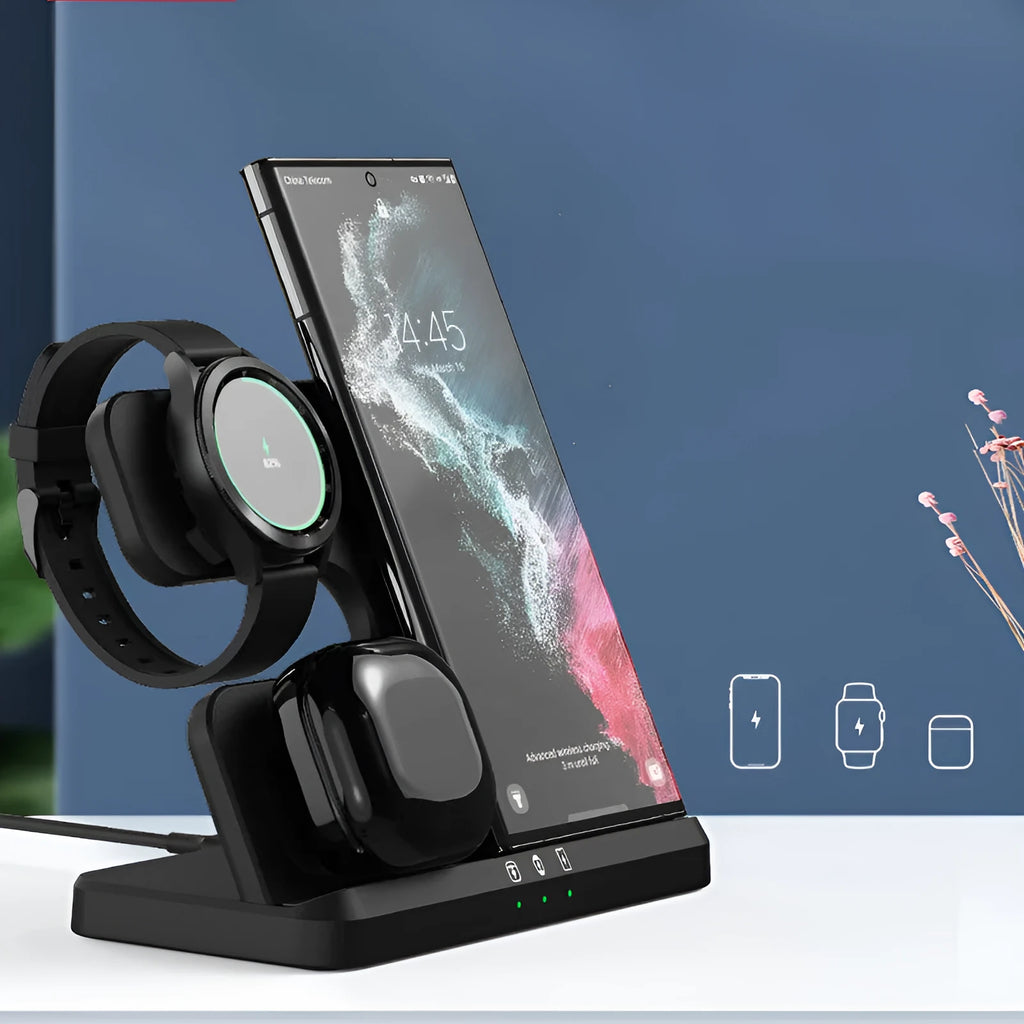 Vertical 3-in-1 wireless charging stand for mobile phone, smartwatch, and headphones on a desk.