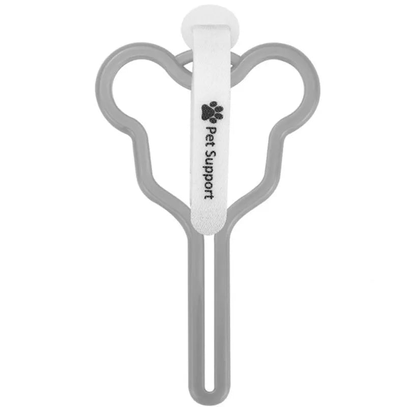 A coloured dog poop bag holder with a Velcro strap attached to a dog lead.