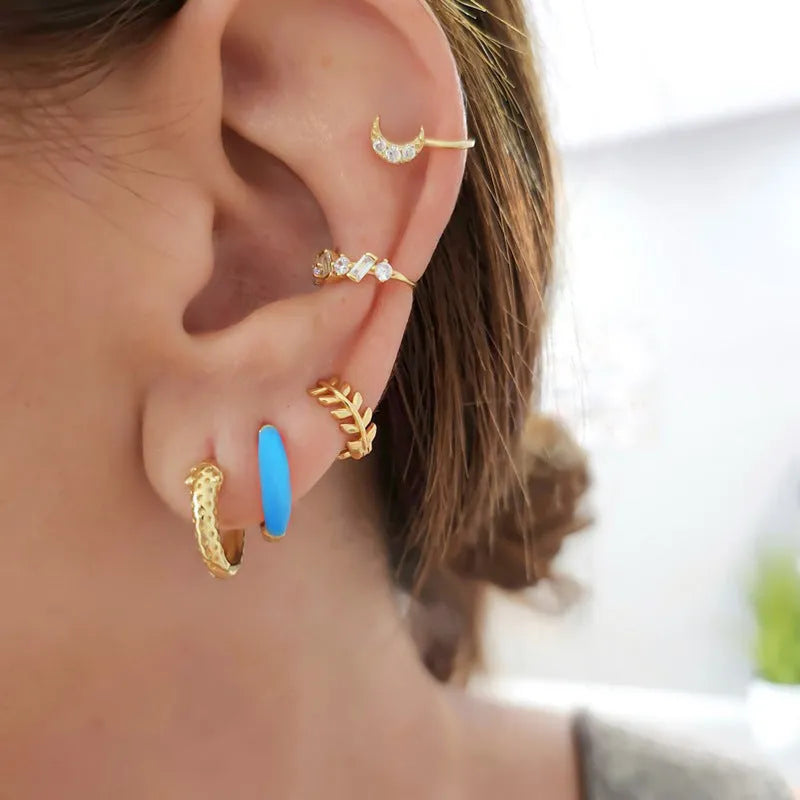 Handmade curved oval epoxy earrings in multiple colours on a Silver Needle copper base.
