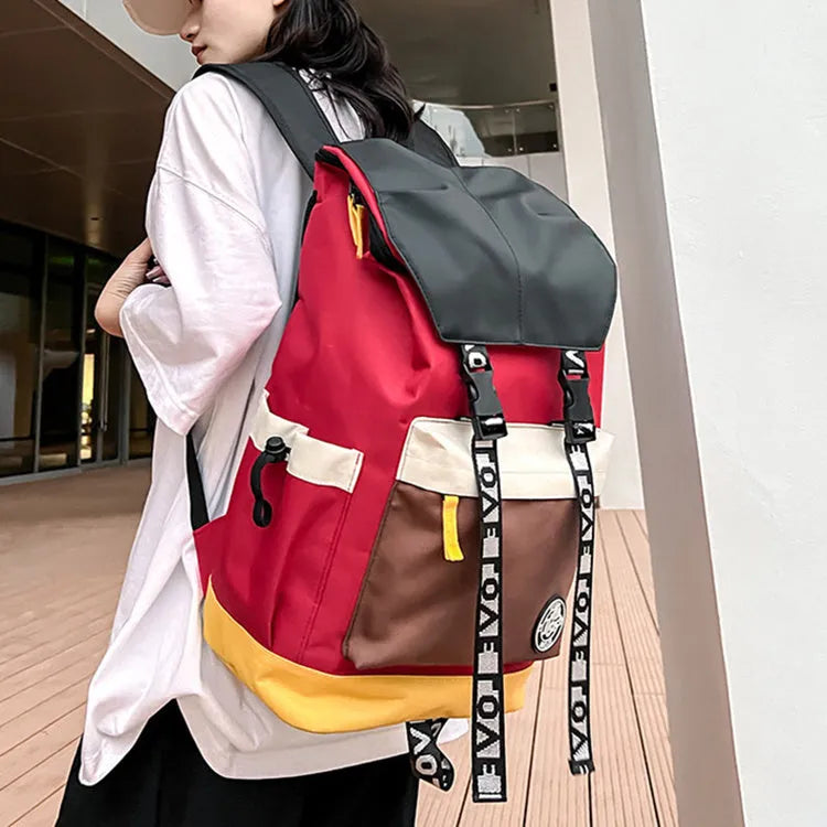 Oxford cloth school backpack showing black, green and red colour options with handheld and shoulder straps