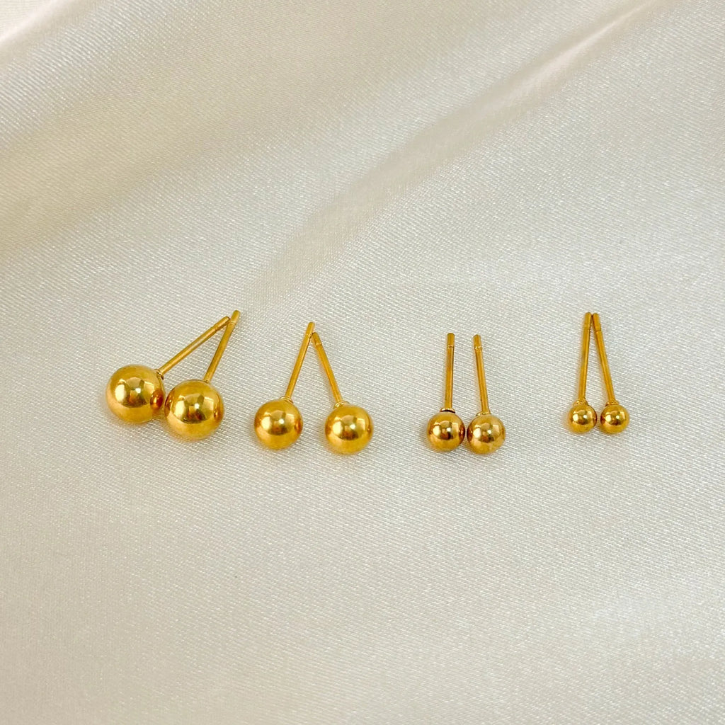 Stainless steel ball stud earrings with minimalist geometric design in gold or silver finish