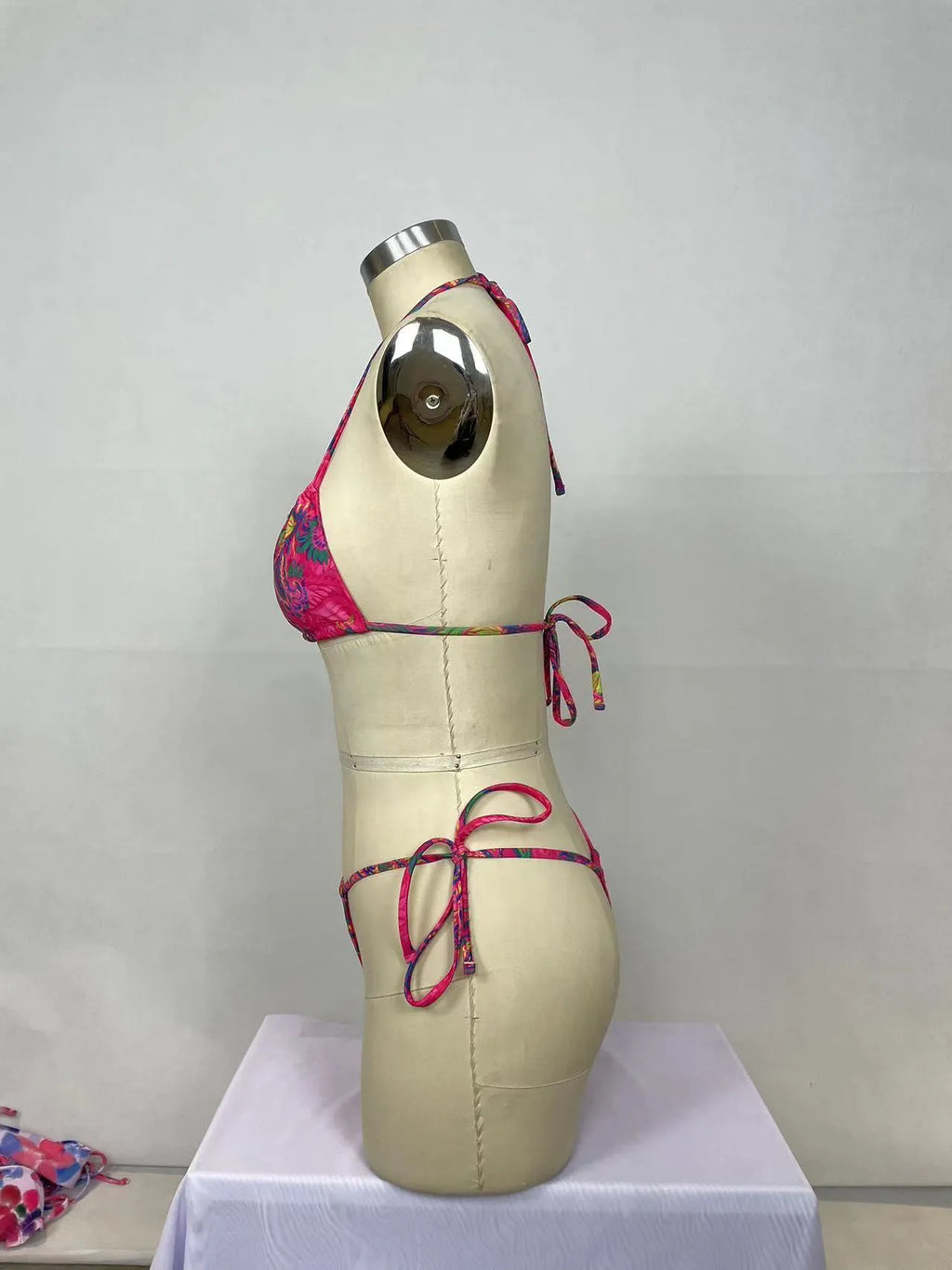 Pink women's nylon bikini two-piece swimsuit set with multiple style options for swimming