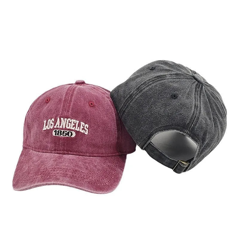 Retro washed distressed personalised embroidered peaked cap in acrylic fabric, shown on a mannequin.