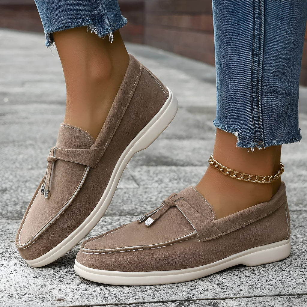 Men's apricot coloured canvas slip-on loafers with a platform rubber sole on a white background.