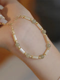 Women's bamboo knot bracelet with 6mm round beads in Hetian jade or South Red agate stone