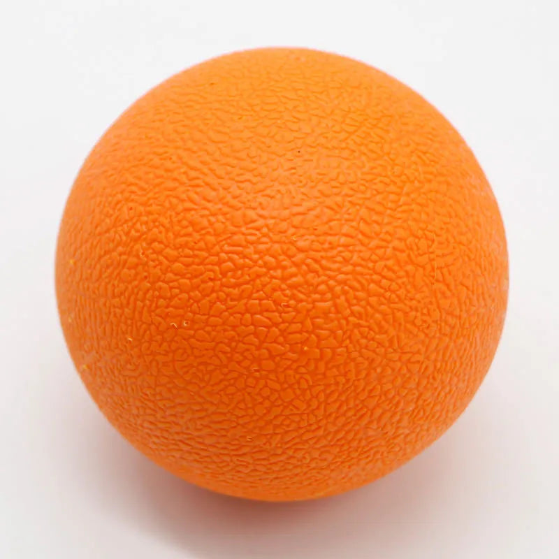 Green TPE yoga massage ball with 6.1 cm diameter on a plain background.