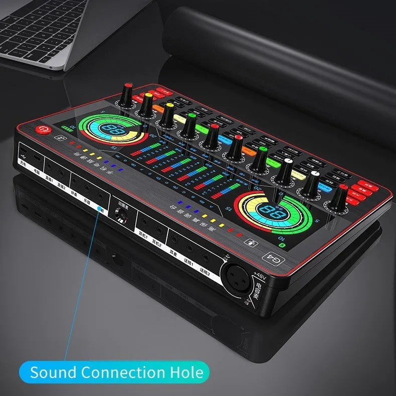 G4 professional singing sound card set with LCD display, microphone, and remote control on a desk.