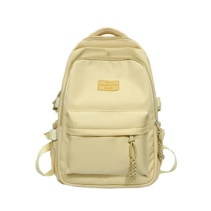 Korean-style lightweight waterproof nylon backpack for primary school students in macaron colour with curved shoulder strap, 20-35L capacity