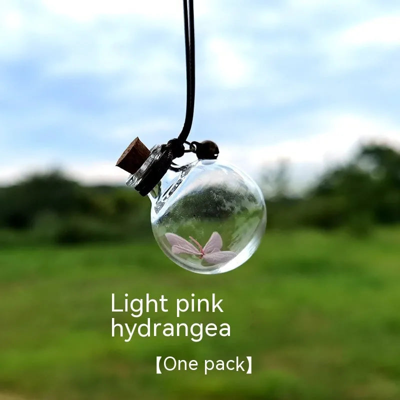 Glass car perfume pendant with preserved flowers in selected colour and diameter