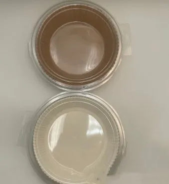 Round disposable paper liners for air fryers with 4.5cm high edges in white parchment colour