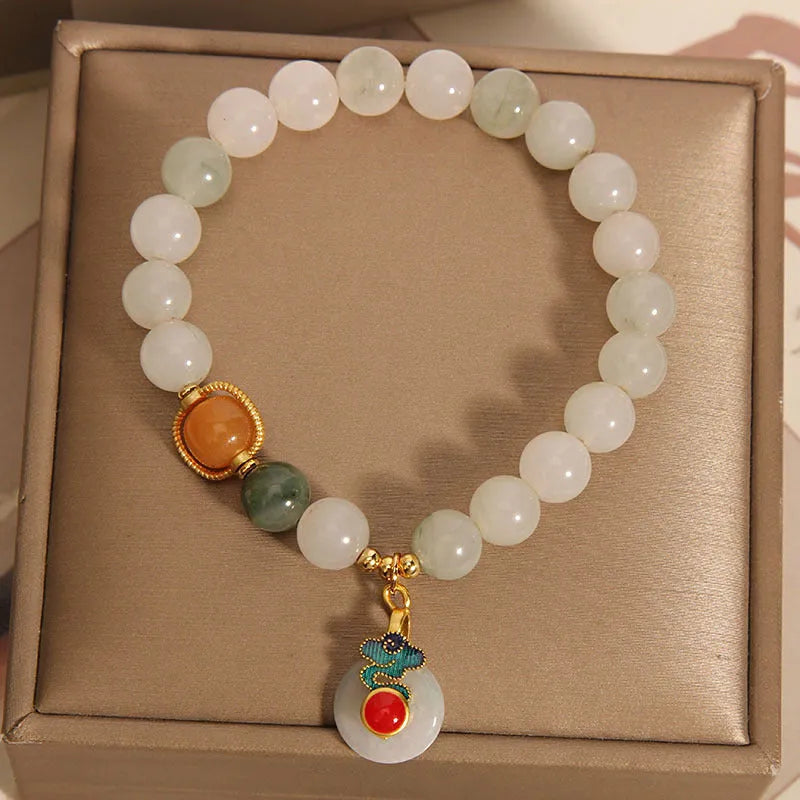 Ice jade colour bracelet with pearl decorations and Xiangyun peace jade buckle
