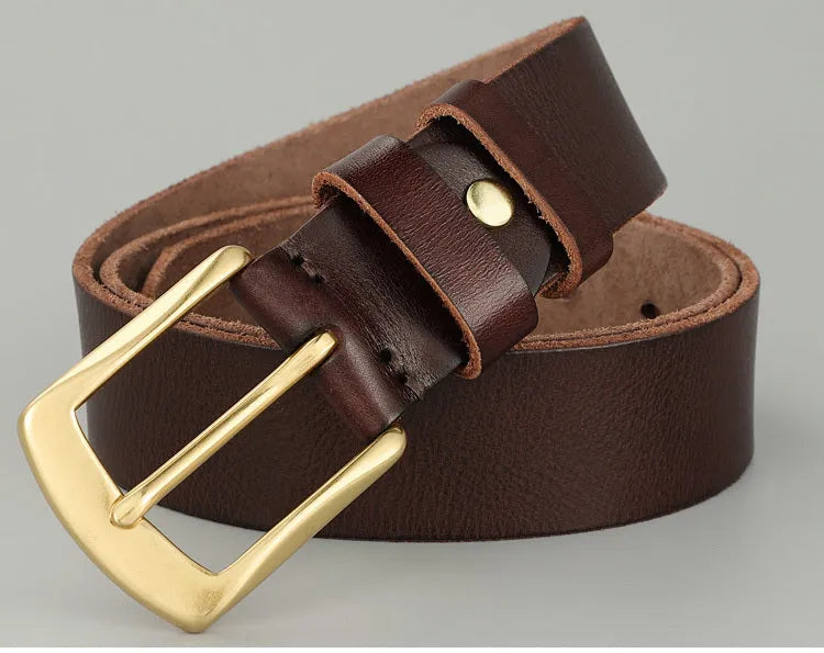 Handmade casual men's cowhide belt with needle buckle and leather decoration, black colour, on a plain background