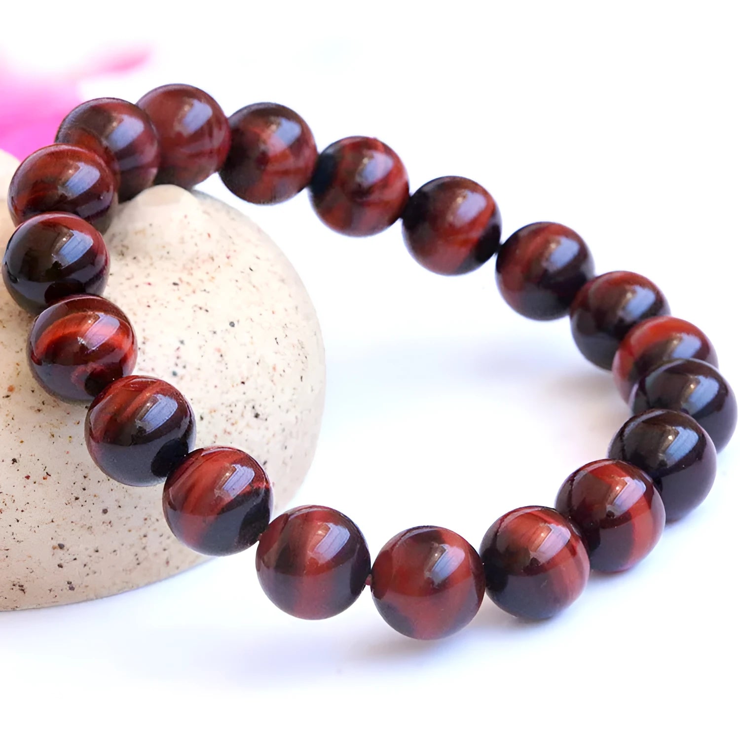 Handmade tiger's eye gemstone bracelet with lightning cat's eye pattern in geometric round beads