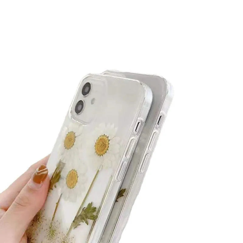 White clear epoxy daisy floral design TPU phone case for iPhone, shown from the back.