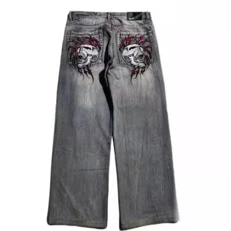 Men's grey washed-out straight-leg jeans with wide-leg workwear design.