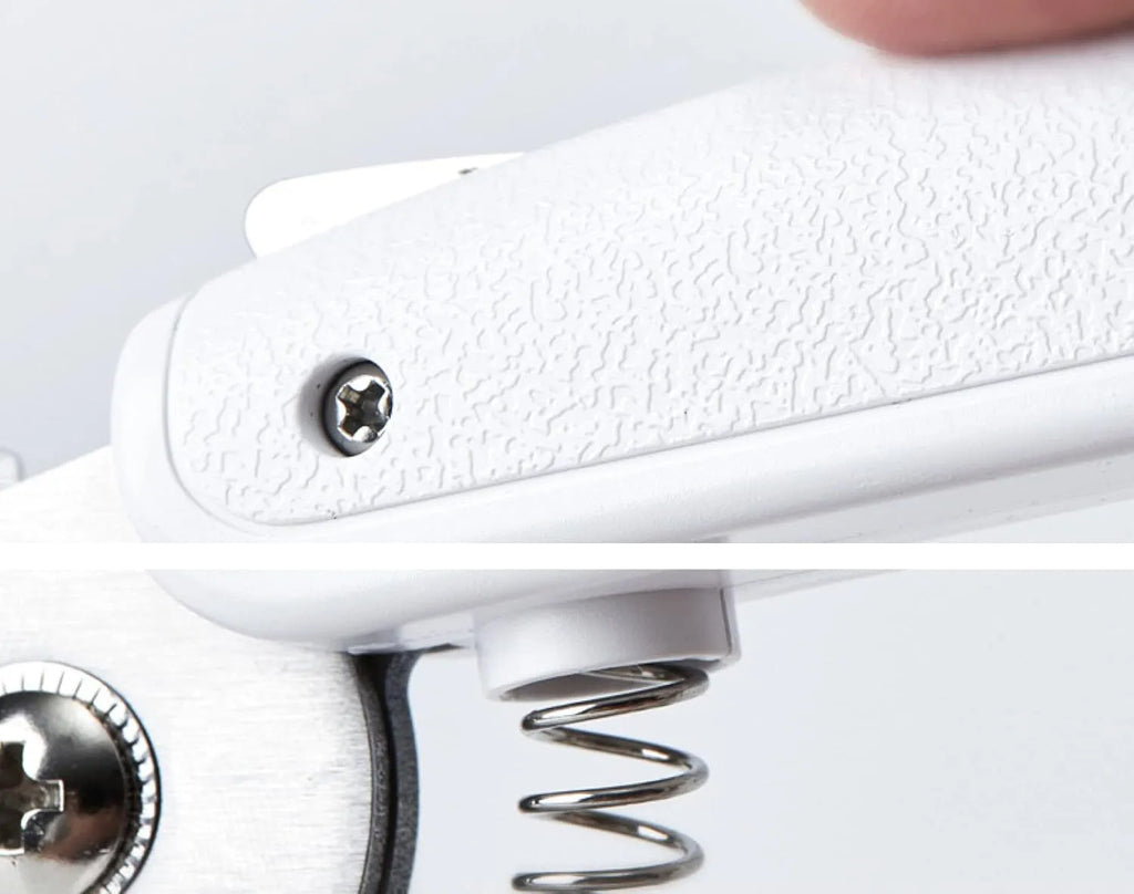 White LED pet nail clippers for cats and dogs with open transparent safety guard and nail file.