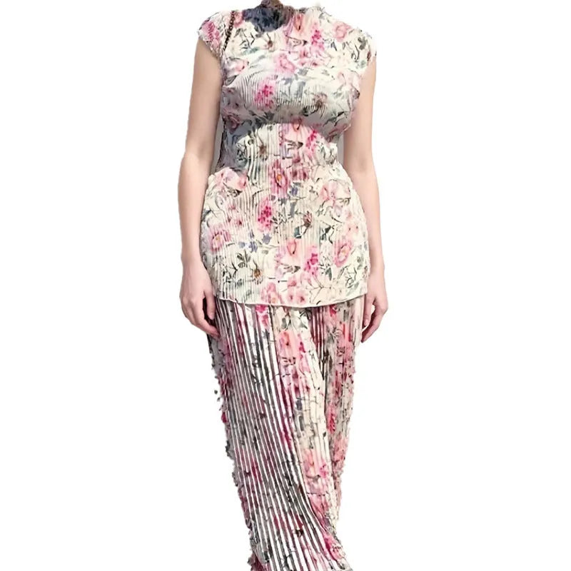 Women's long sleeve printed chiffon top paired with a high waist matching skirt.