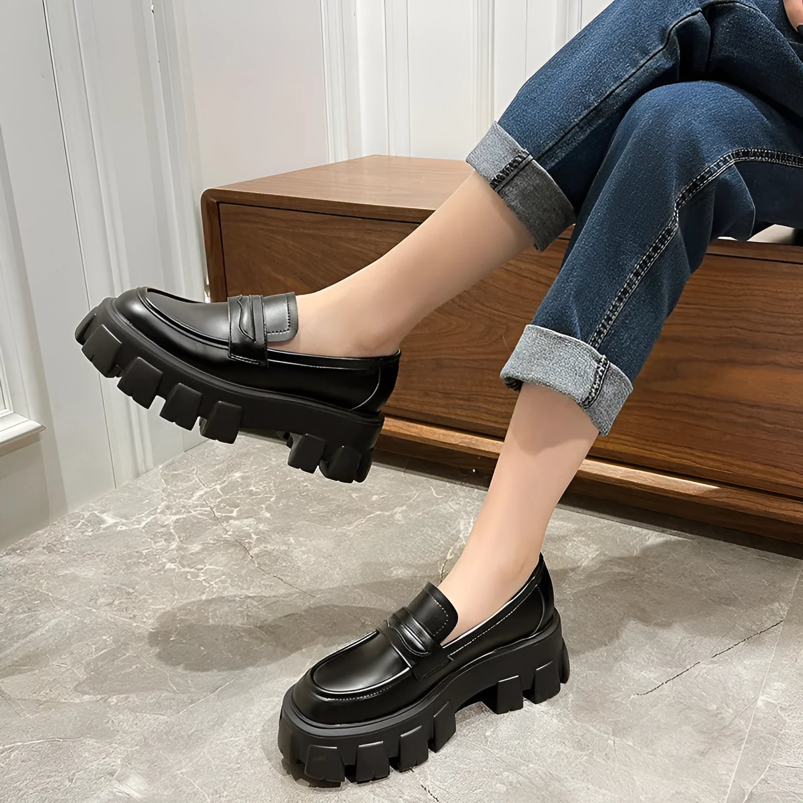 British style wide fit loafers with chunky rubber sole and muffin heel in patent leather.