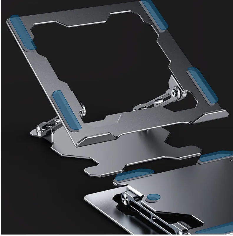 Grey portable aluminum laptop stand shown folded and in use with a silver laptop, demonstrating its adjustable angle.