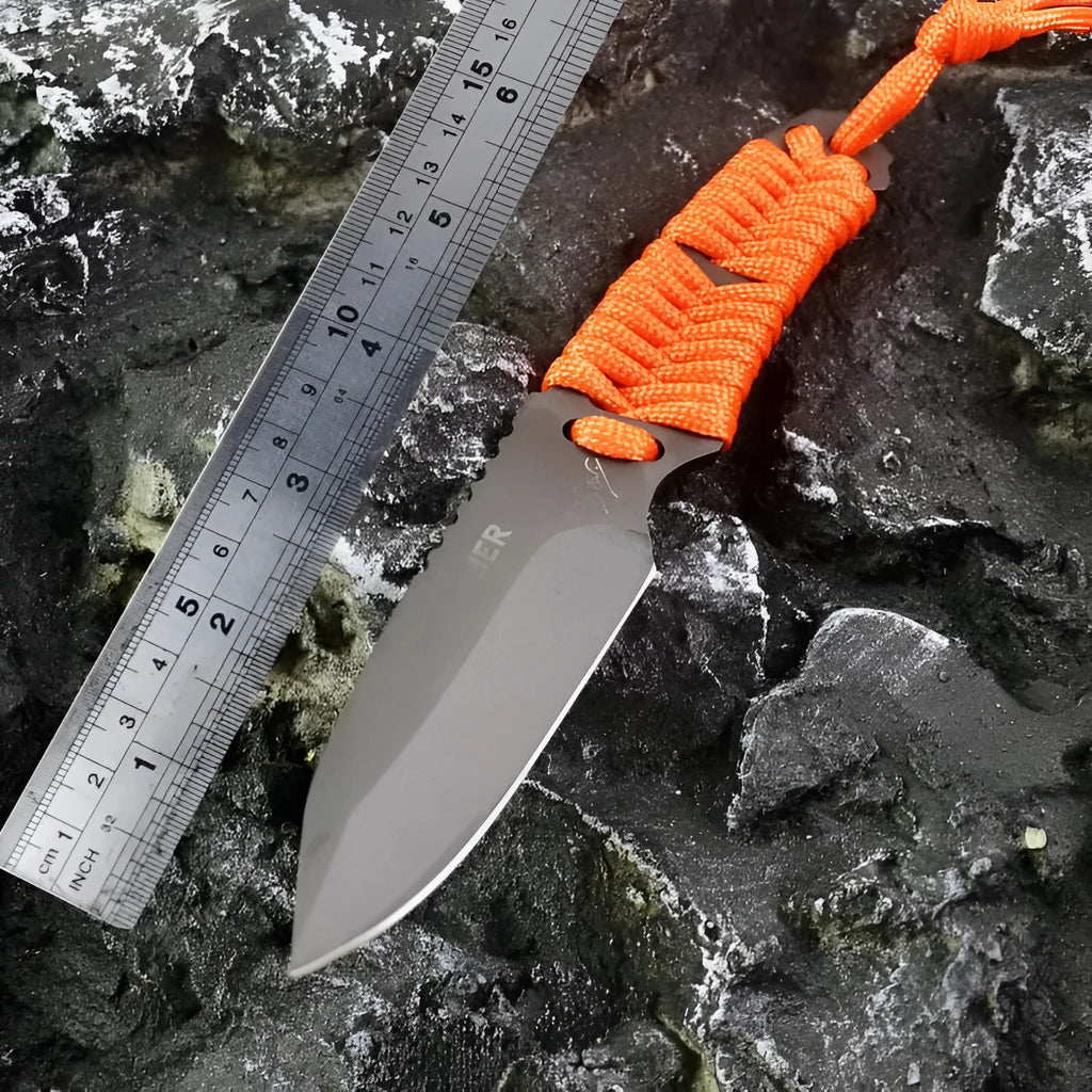 Camping knife with straight blade and rope bound handle showing ABS sheath