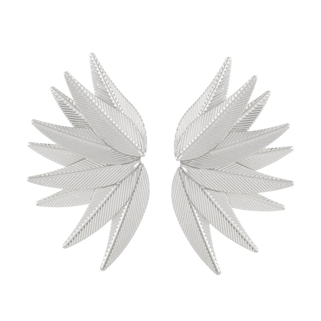 Gold and white leaf-shaped alloy patch earrings showing botanical design