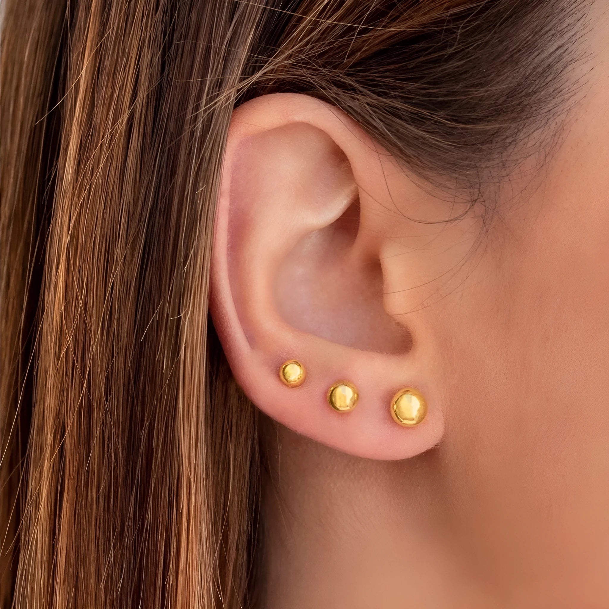 Stainless steel ball stud earrings with minimalist geometric design in gold or silver finish