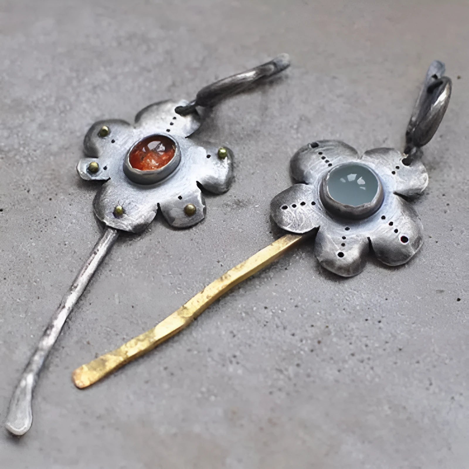 Geometric floral retro earrings with two-tone asymmetrical design and long drop style.
