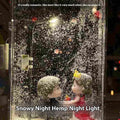 DIY kit for assembling a snowy landscape night light with LED effects on a desktop.