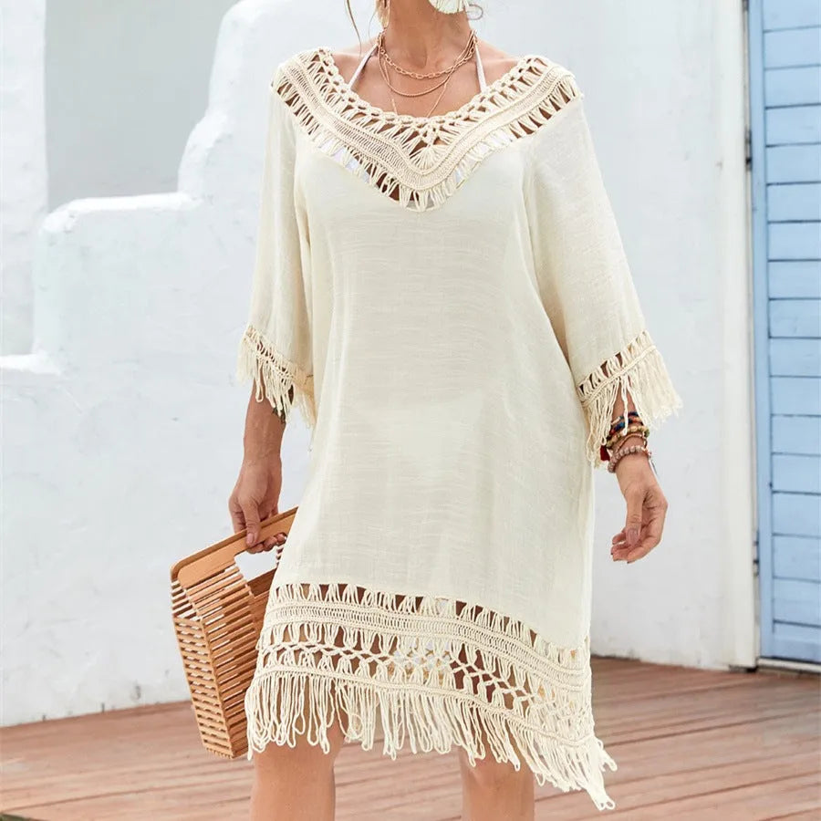 Women's apricot crochet patchwork beach dress with half sleeves, shown on a hanger.