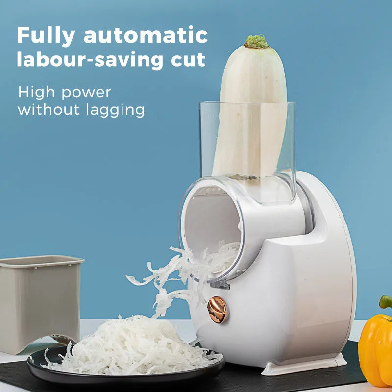White electric vegetable slicer with rotary blades and suction base for kitchen food preparation
