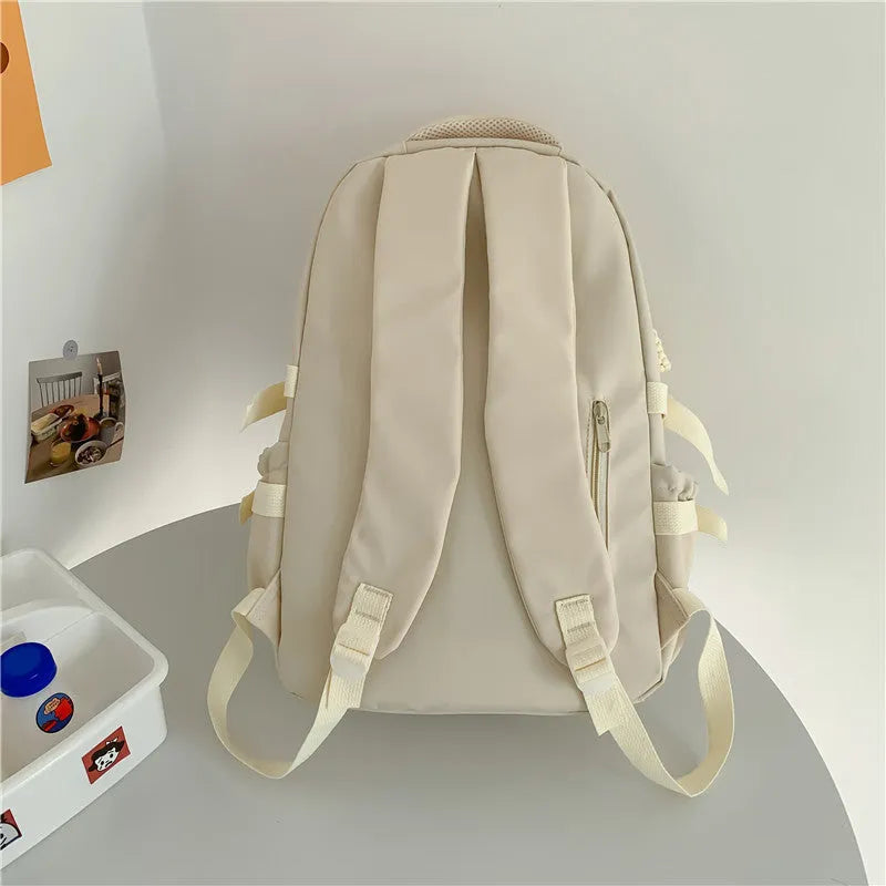 Korean-style lightweight waterproof nylon backpack for primary school students in macaron colour with curved shoulder strap, 20-35L capacity
