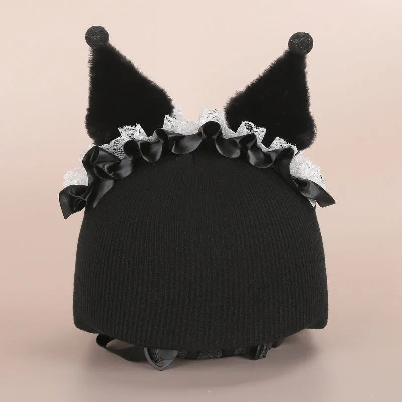 Plush cartoon-themed cover set on a medium motorcycle helmet with soft ear decorations.