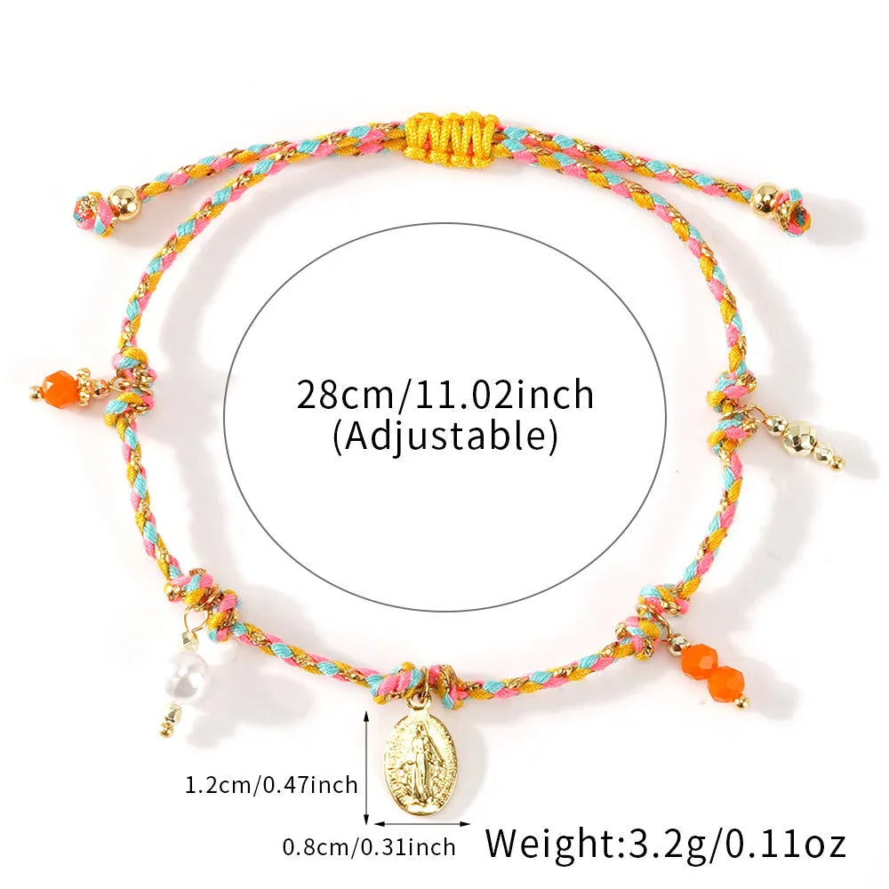 Close-up of a hand-woven ethnic style bracelet for women made from colourful braided rope, showing the strap tag detail.
