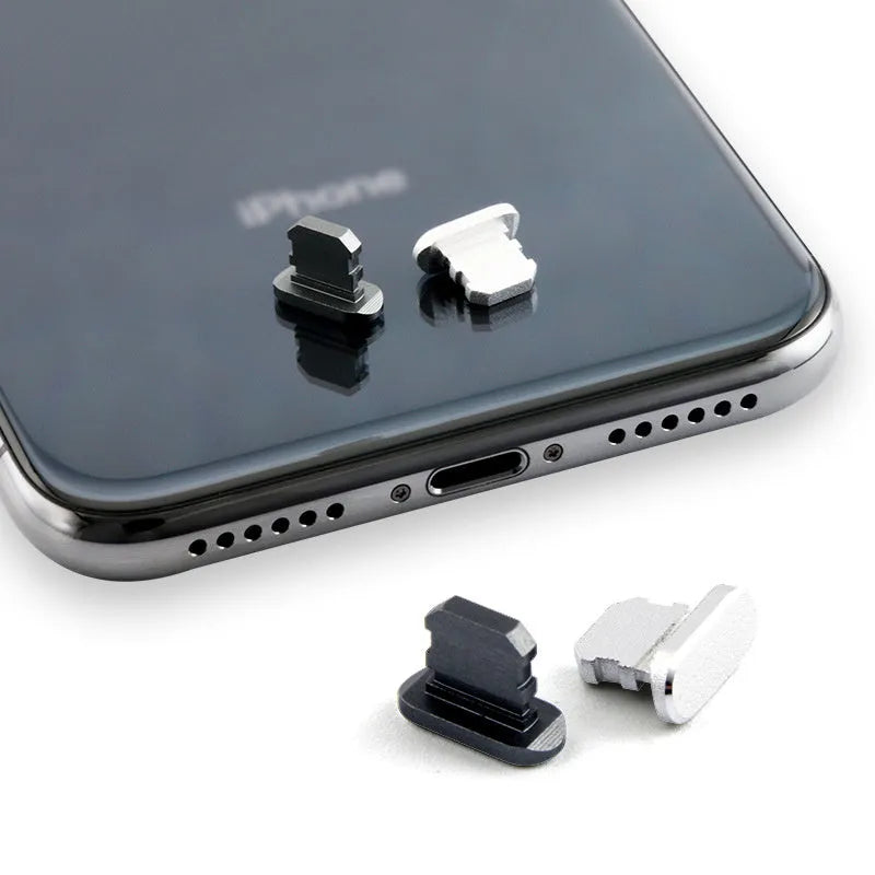 Aluminium alloy mobile phone charging port dust plug for iPhone, shown in multiple colours.
