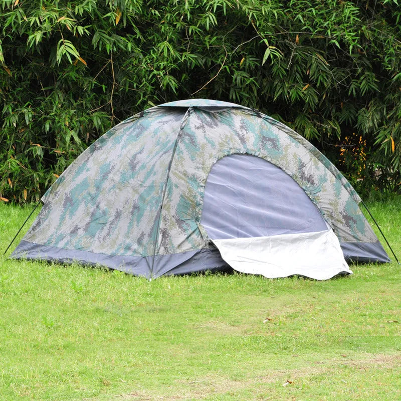 Green camouflage dome tent with mesh windows and steel ground nails setup outdoors