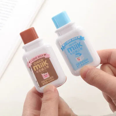 A bottle-shaped correction tape with cute patterns, showing the 6M tape length and curved design.