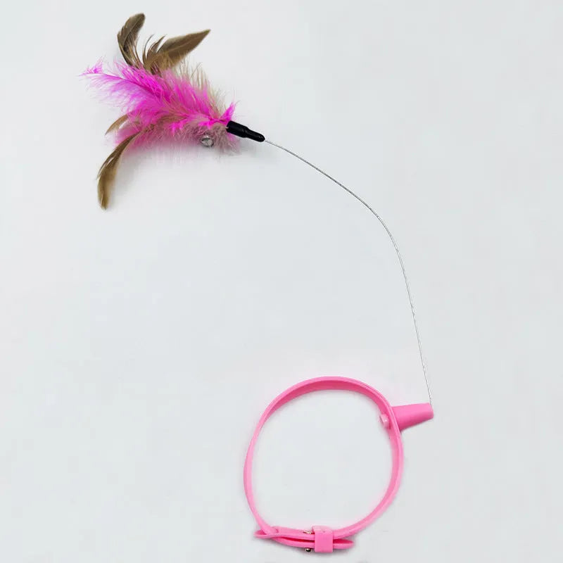 Adjustable cat collar toy with elastic feather teaser in pink or blue colour options