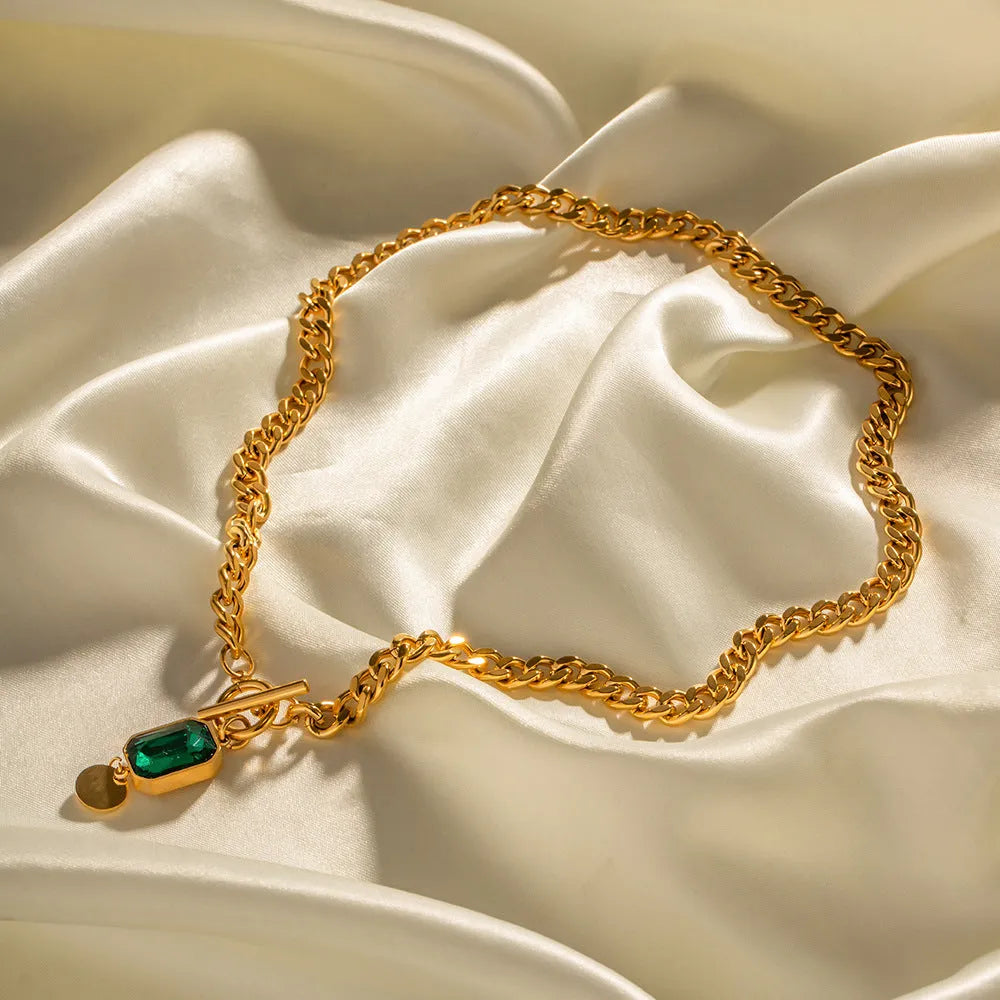 Gold titanium steel necklace with geometric round emerald zircon pendant on Cuban link chain