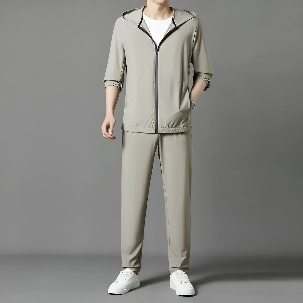 Korean style loose hooded sun-protective suit in grey, blue, or black, featuring top stitching pockets.
