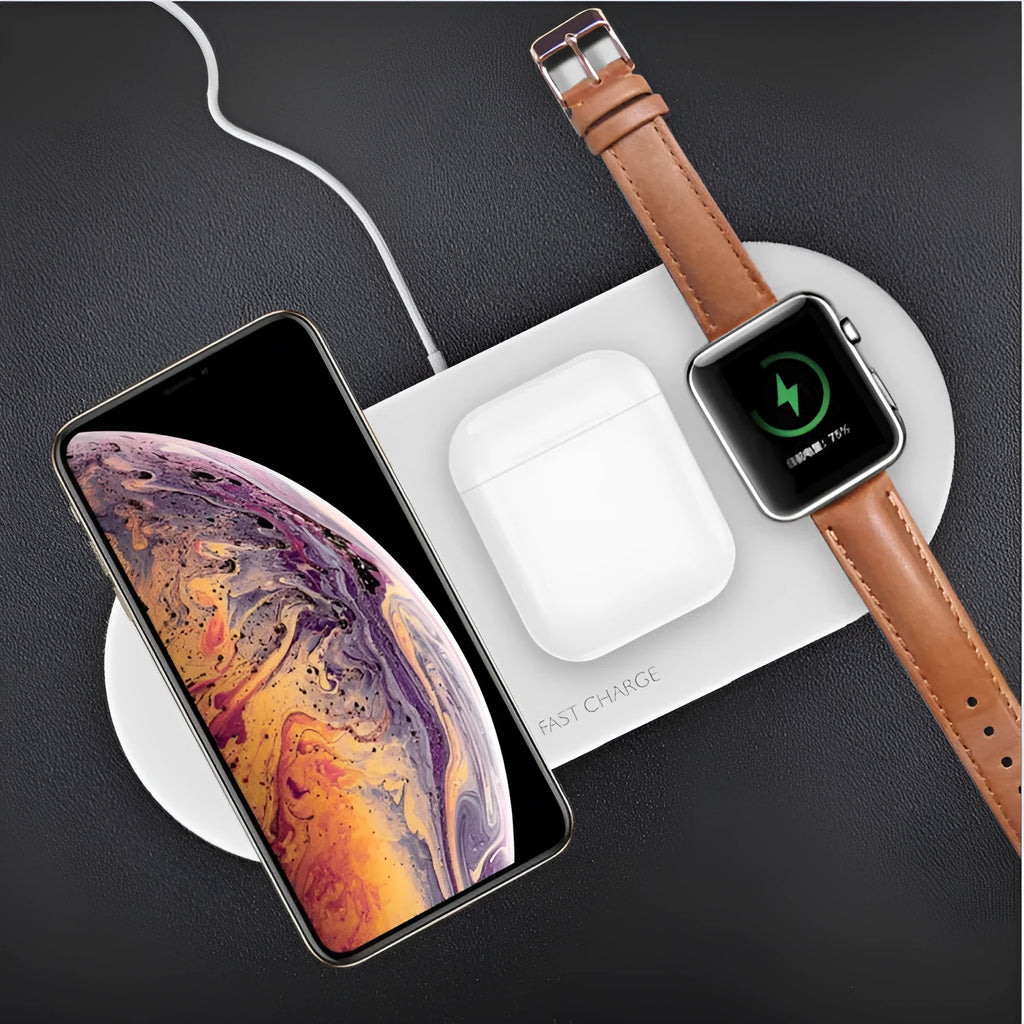 White three-in-one wireless charging station for Apple iPhone, watch, and headphones on a desk.