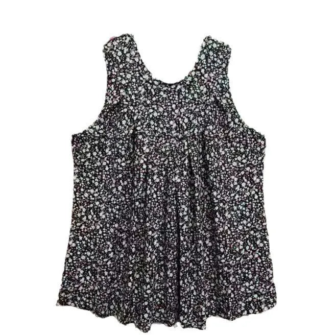 Black floral print sleeveless vest on a hanger, showing loose fit and round neck for plus sizes.