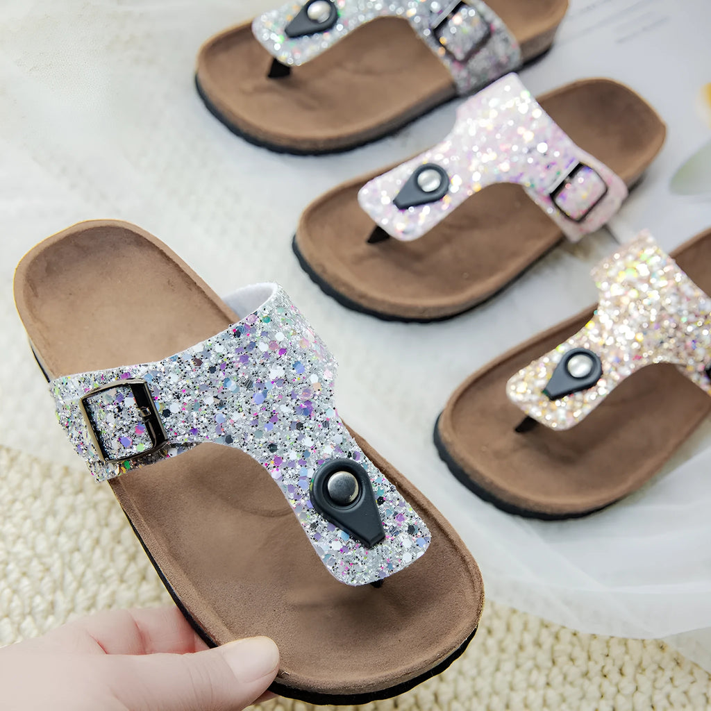 Cork flip-flops in pink, silver, and gold colours with artificial leather uppers and PVC soles