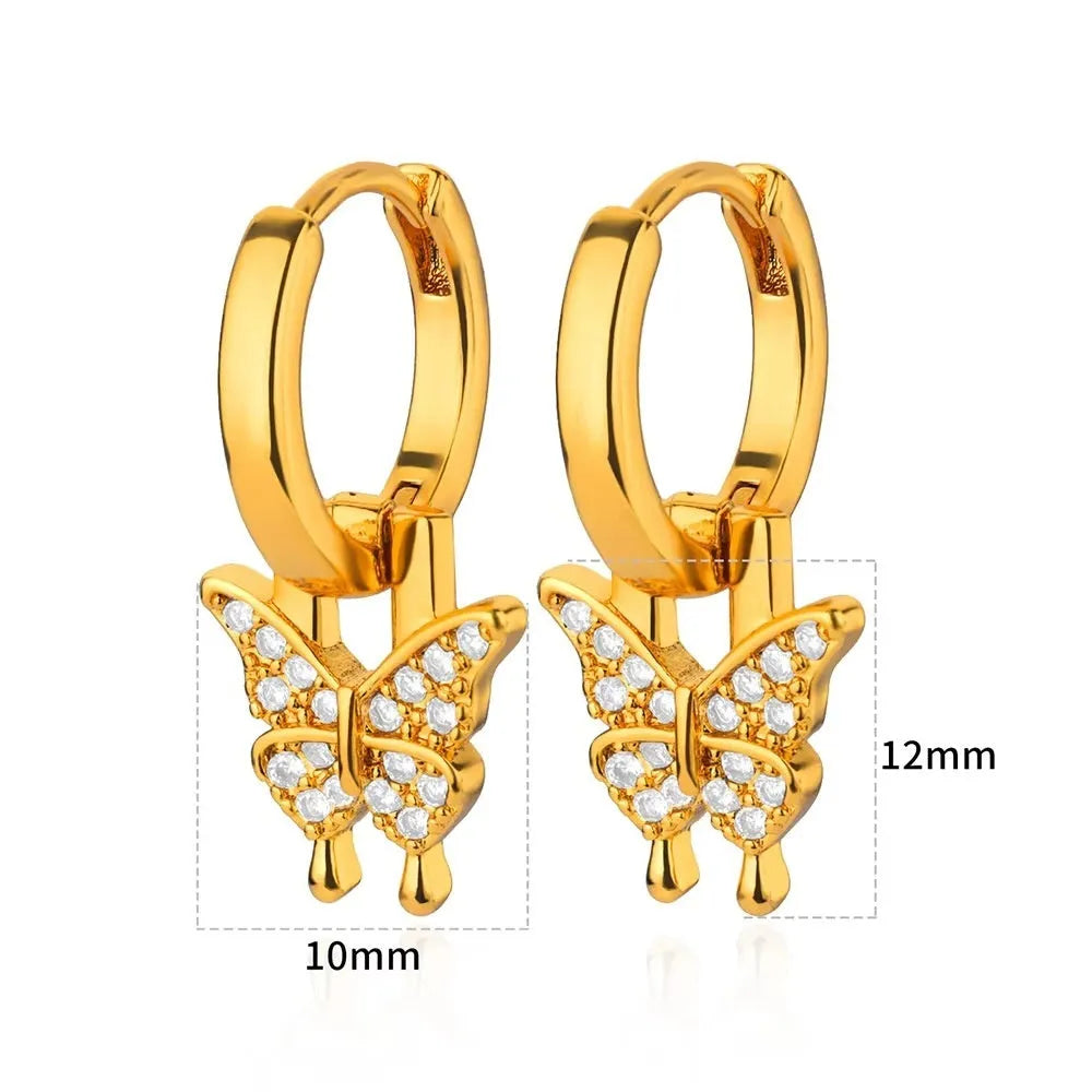 Women's copper butterfly earrings with geometric heart and star shapes.
