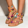 Ethnic beaded petal sandals with artificial PU upper and floral decoration in suit colour