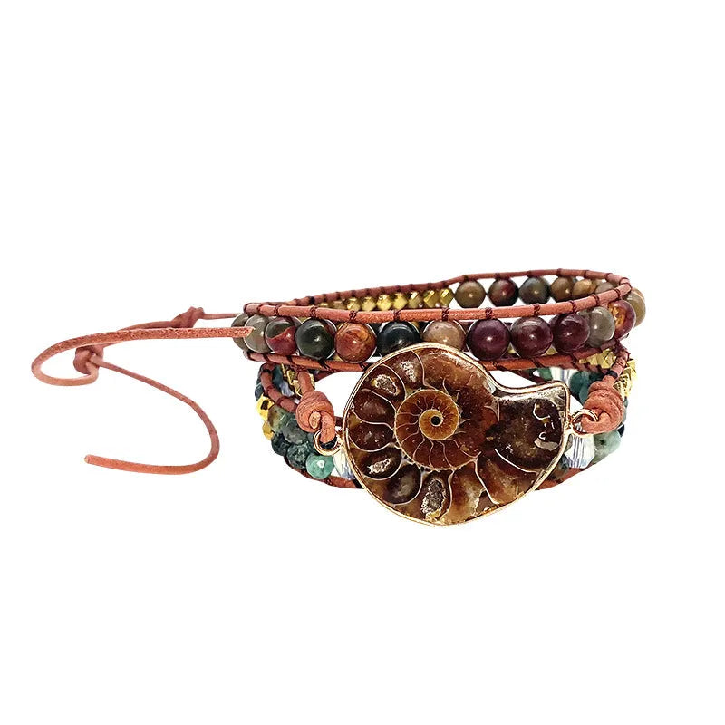 Natural stone bohemian conch bracelet in picture colour on a light background