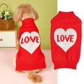 Red love heart design dog sweater on a small dog, showing acrylic knit and appliqué detail.