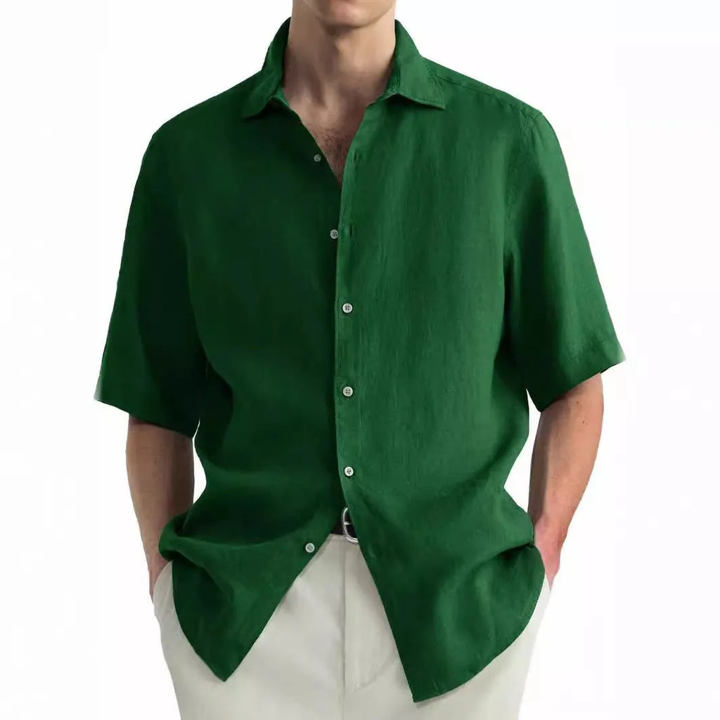 Men's green washed cotton casual shirt with a cardigan style on a hanger.