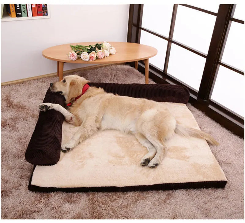 Corduroy bolster dog bed in grey colour with a non-slip base, shown in a large size for big dogs.
